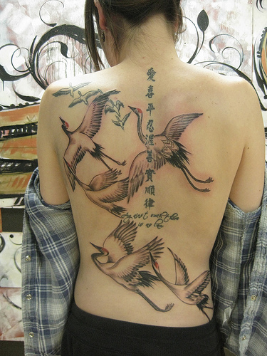 Wonderful crane back tattoo