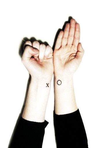 X O wrist couples tattoos