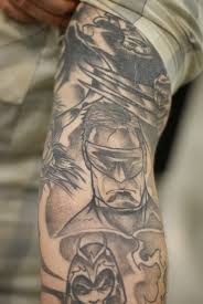 X-men cyclops arm tattoo