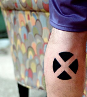 X-men sign arm tattoo