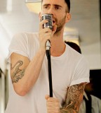 Adam Levine Tattoo Seen While He Singing