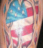 Tortured American Flag Tattoo on Shoulder