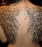 Wing Tattoos Across the Shoulders and Back