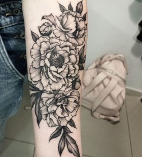 arm dotwork flower tattoo