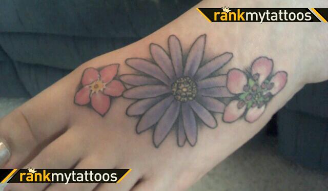 Beautiful Aster Flower Tattoo Design on Foot