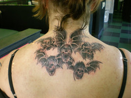 Avenged Sevenfold “Winged Skull” Tattoos on Upper-back