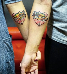 awesome watercolor couple tattoo