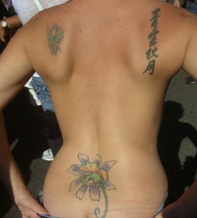 Unique Tattoo Design on Back for Girls