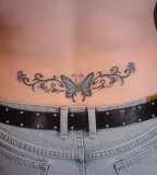 Small Butterfly Lower Back Tattoo Design for Girls