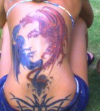 Great Tattoo Design on Upper Back for Girls