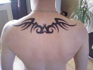 Simple Tribal Tattoo On Upper Back