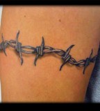 Stunning Upper Arm Circular Barbed Wire Tattoo Design