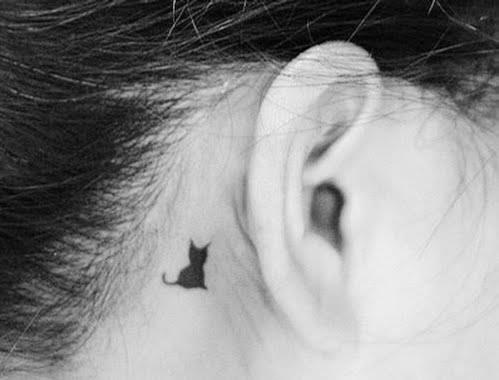 Cute Black Cat Behind The Ear Tattoo
