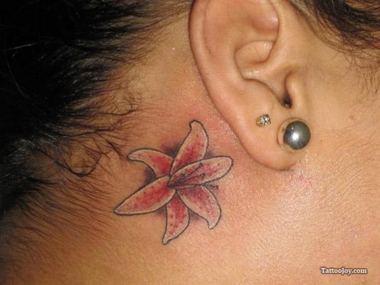 Lily Blossom Behind The Ear Tattoo