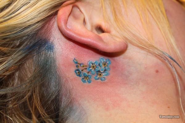 Tiny Blue Flowers Behind Ear Tattoo Images
