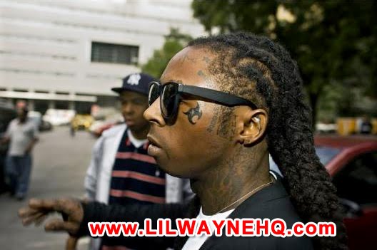 Lil Wayne Biohazard Symbol Tattoo on Cheek