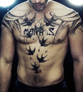 bird cover up man tattoo