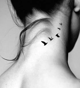 bird tattoo on neck for women