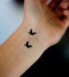 Lovely Couple Birds Silhouette Tattoo on Wrist Design