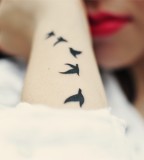 Cute Flying Birds Tattoo Set on Girl's Side Lower Arm