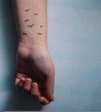 Birds Clump Tattoo On Wrist