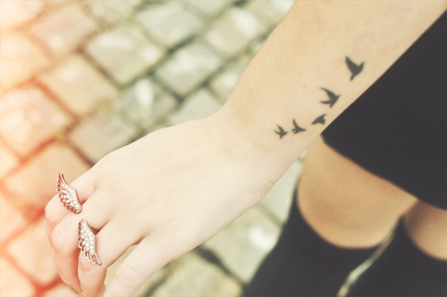 Awesome Five Flying Birds Silhouette Tattoo on Wrist