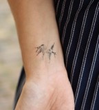 Two Flying Little Birds Tattoo on Wrist