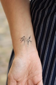 Two Flying Little Birds Tattoo on Wrist