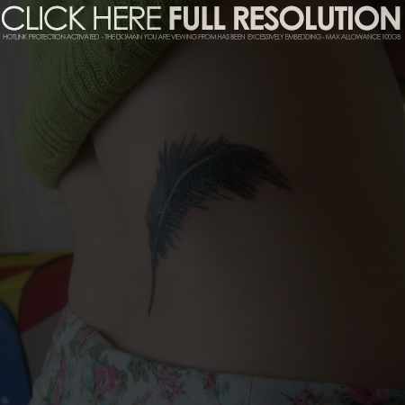 Feather Tattoos Meaning On Ribs