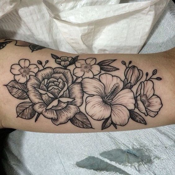 black and grey Hawaiian flower tattoo