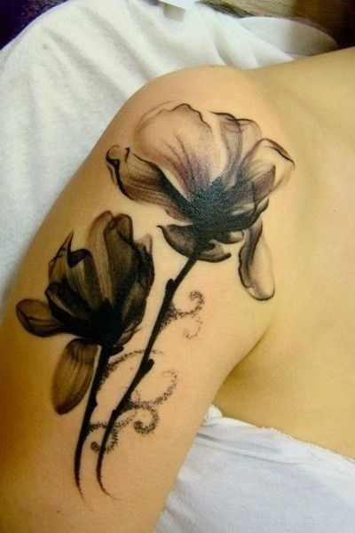 black and grey watercolor effect flower tattoo