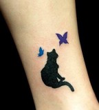 Black Cat Chasing The Butterfly Tattoo