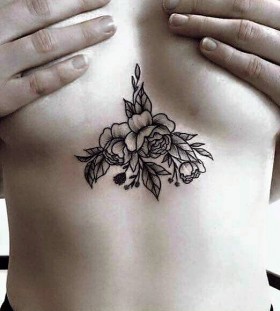 blackwork-flower-sternum-tattoo