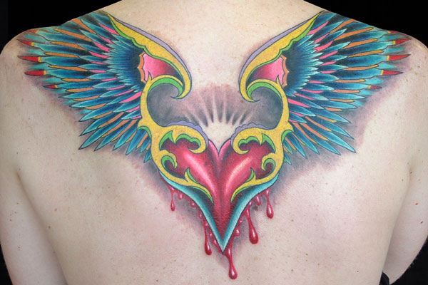 Color Tattoo Of A Flying Bleeding Heart The Wings