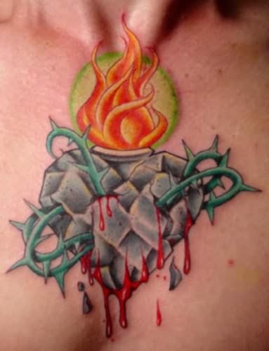 Cool Bleeding Heart Tattoo On Chest