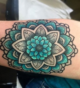 blue and green mandala tattoo