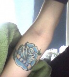 Cute Blue Rose Tattoo Design on Forearm