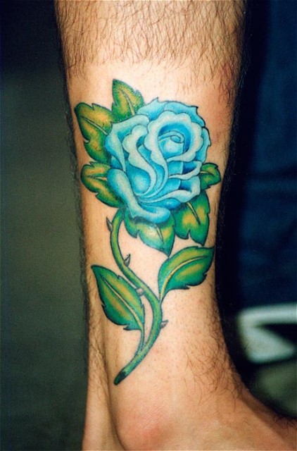Beautiful Blue Rose Queen Tattoo on Forearm