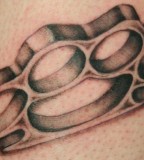 Brass Knuckles Hands Tattoos Design