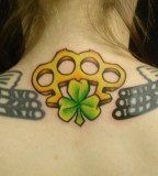 Tattoo of Knuckle on Upper Back