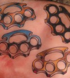 Piggys Brass Knuckles - Tattoo Ink Design