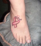 Breast Cancer Ribbon Symbol Tattoo on Female Leg