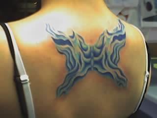 Kickass Butterfly Tattoo for Upper Back