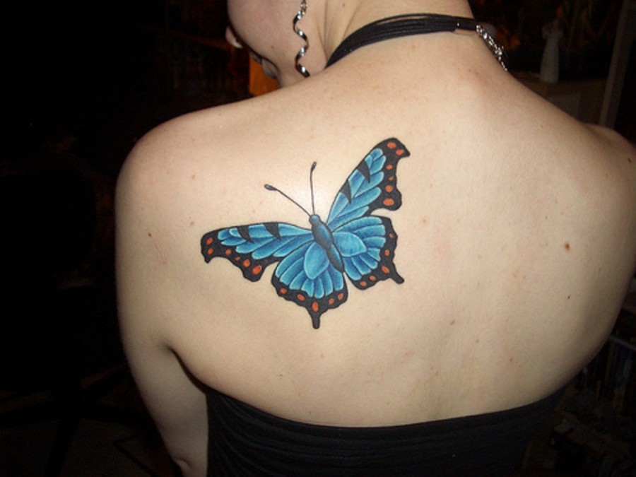 Sweet Blue Butterfly Tattoo On Back For Girls