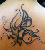An Awesome Unique Butterfly Tattoo Design At Upper Back