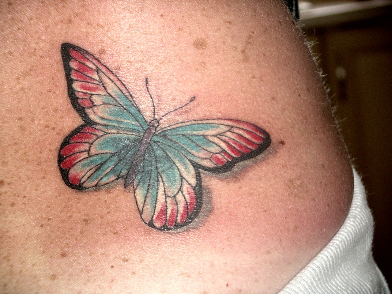 Back Butterfly Tattoo Design For Girls.
