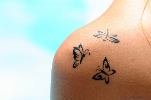 Three Cute Black Butterfly Tattoos on Shoulder