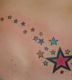 Colored Stars Tattoo on Hip