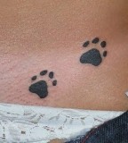 Footpronts Tattoo On Hip