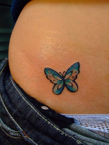 A Blue Butterfly Tatto on Hip